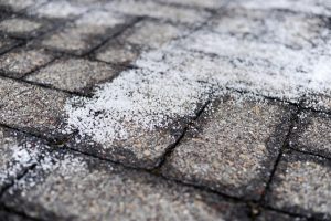 Salt on the sidewalk.